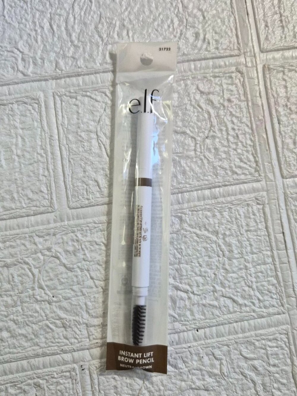 e.l.f. Instant Lift Brow Pencil in the shade Neutral Brown with spoolie Natural